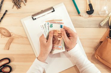 Carpenter Counting Money